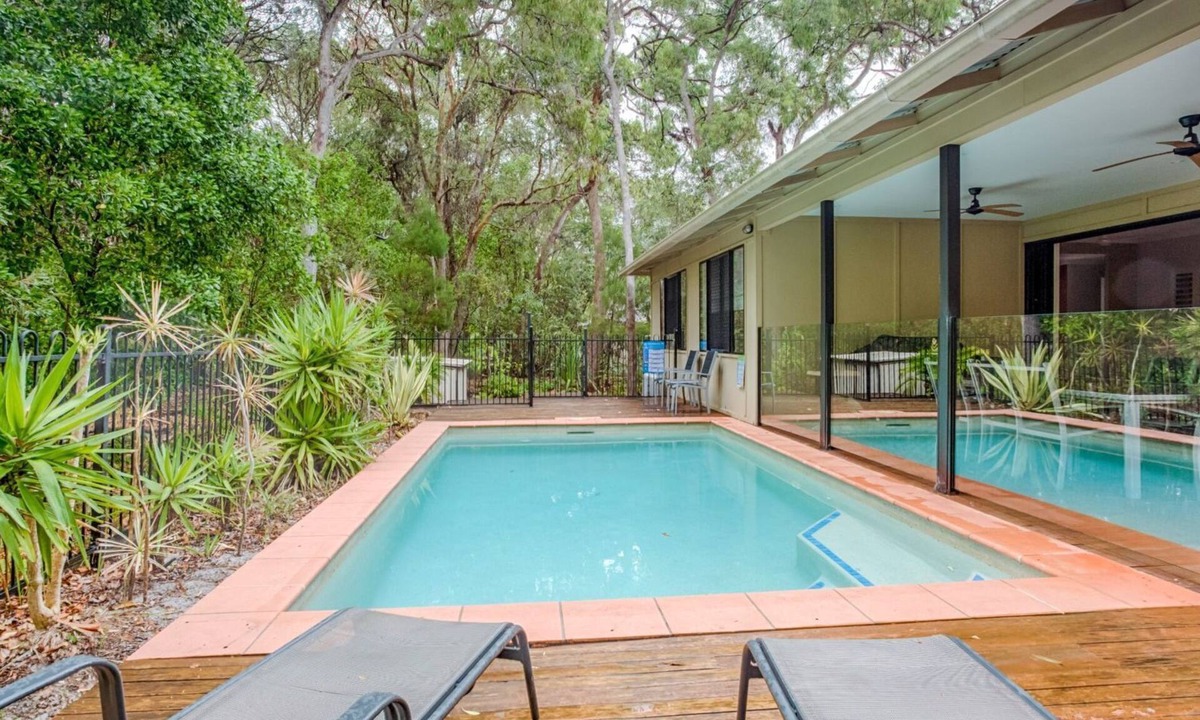 Rainbow Beach House | 8 Ibis Court - Rainbow Shores. Swimming Pool, Walk to Beach, Executive Beach House