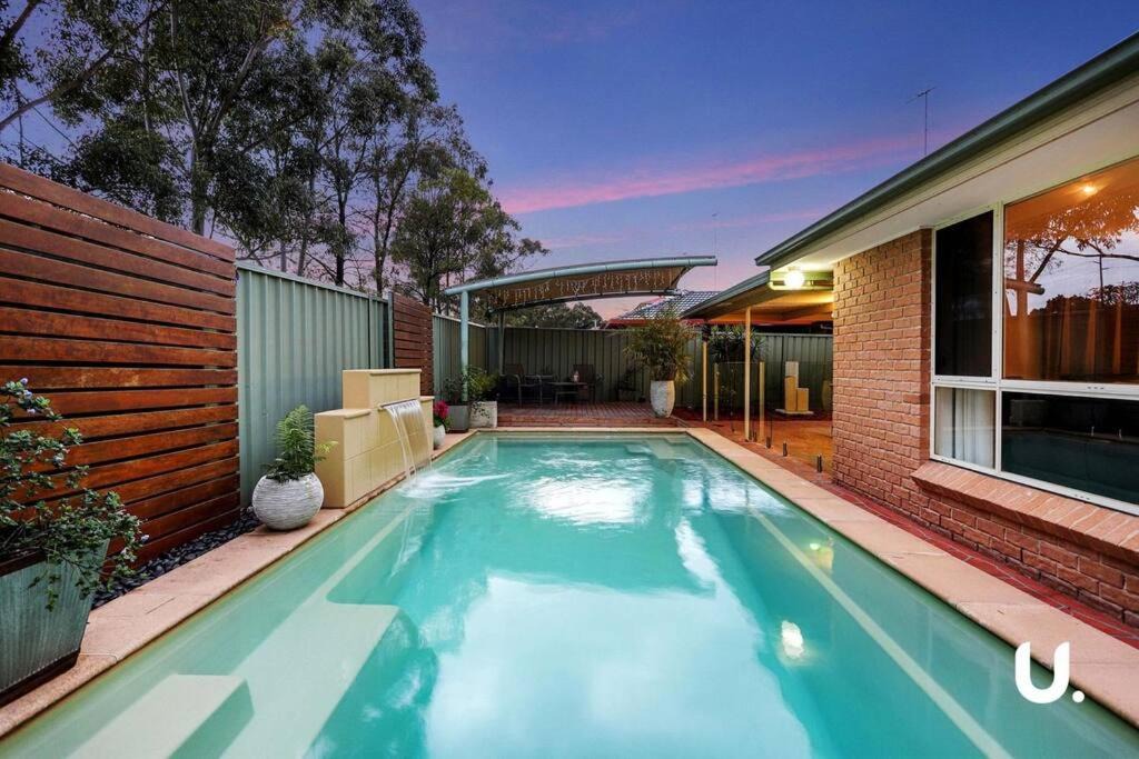 Glenmore Park Villa | Blue Haven Retreat - Glenmore Park Pool Home