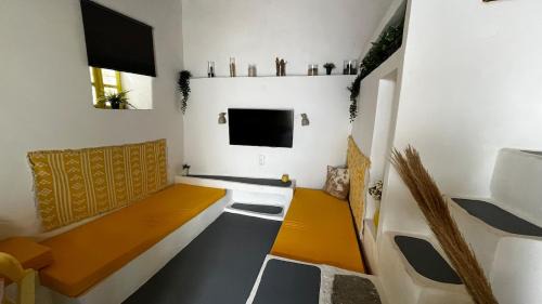 Serifos Apartment | Camaraki Yellow House, Chora Serifos