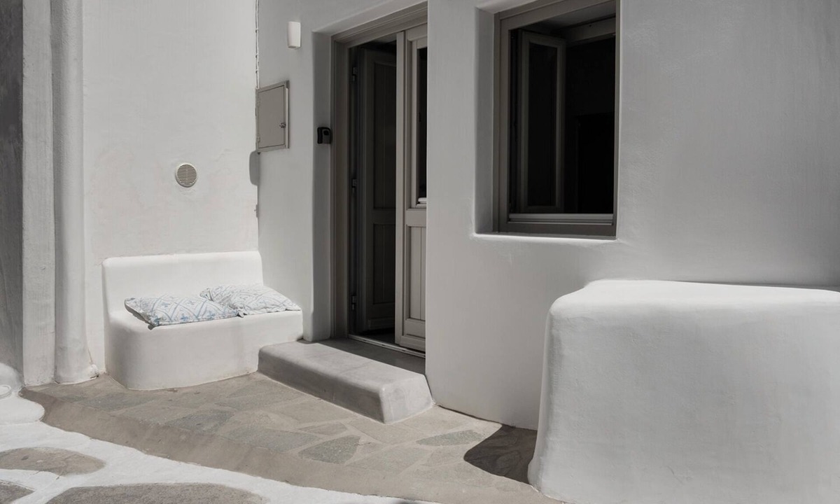Mykonos Town House | Charming central townhome with bench in picturesque Mykonos Town alley, Wi-Fi/AC