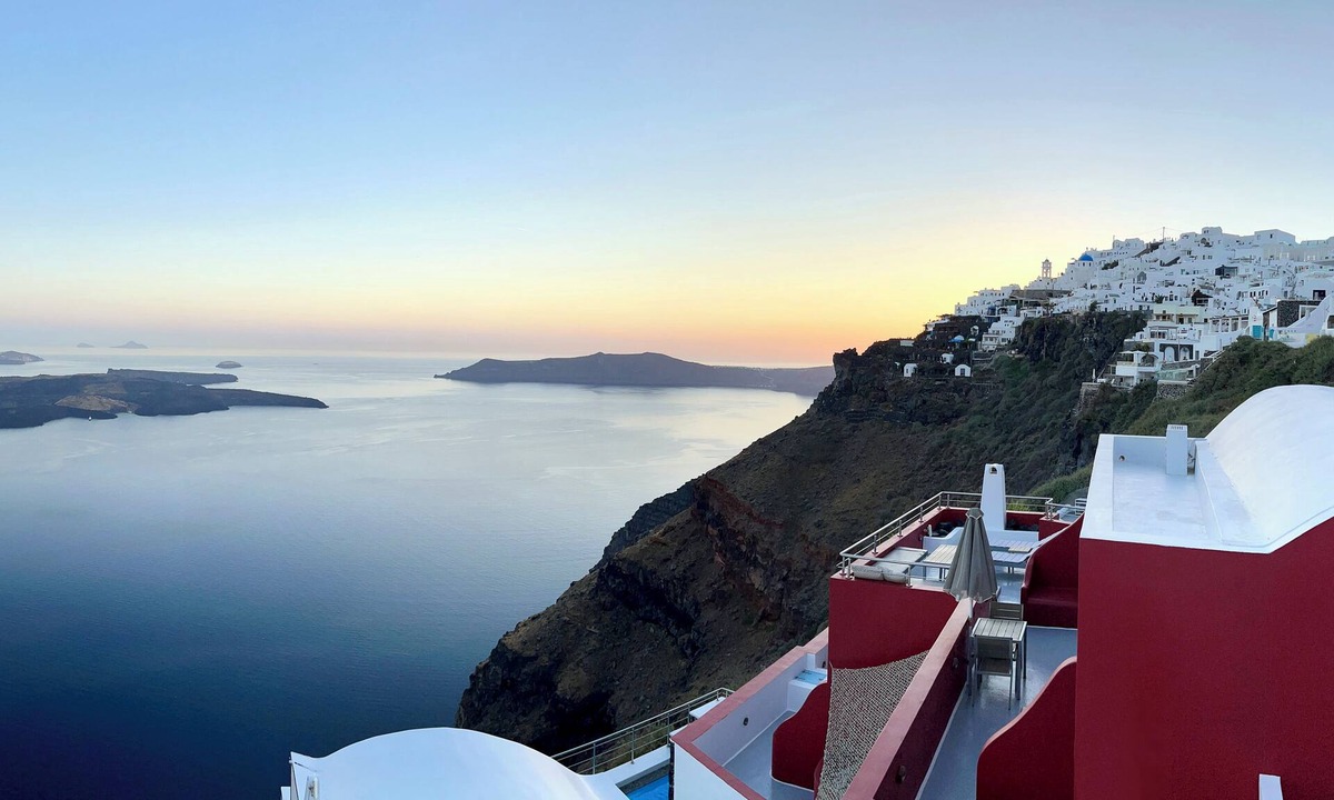 Imerovigli Villa | Hara's Houses, a unique cliffside villa with 5 private studios sharing a pool.