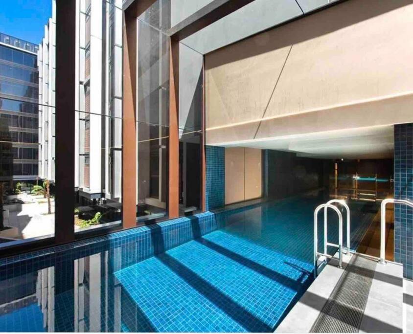 Braddon Apartment | Midnight Luxe 1BR Apartment in the heart of Braddon Views from L7 Pool Sauna Gym Secure Parking Wifi Wine