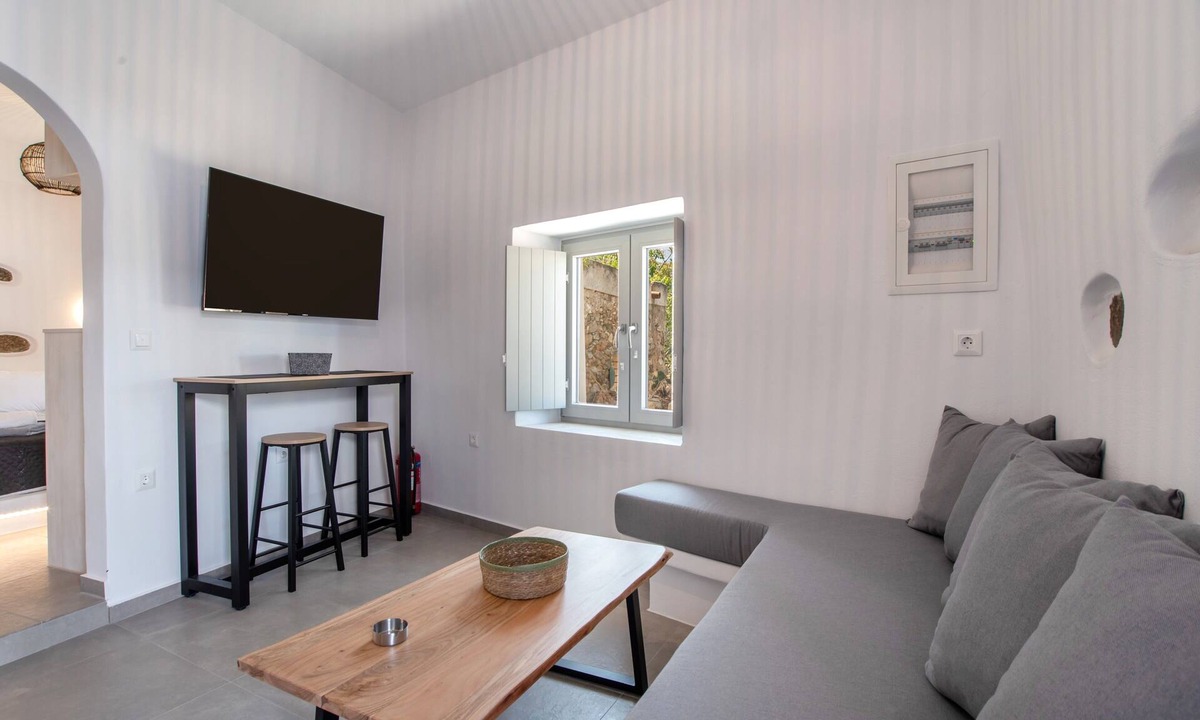 Vivlos Apartment | Naexon Vivlos Stone Escape Apartment with Shared Rooftop, Wi-Fi, and Air Conditioning