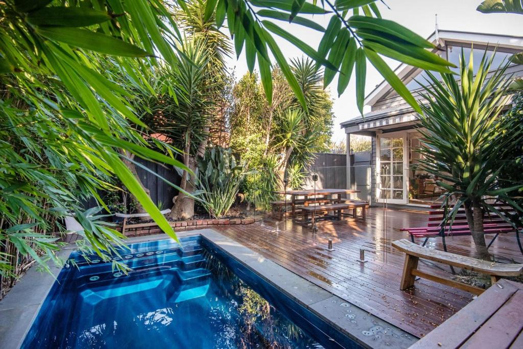 Sandringham House | Sandy Village Retreat Heated Pool Bay Views