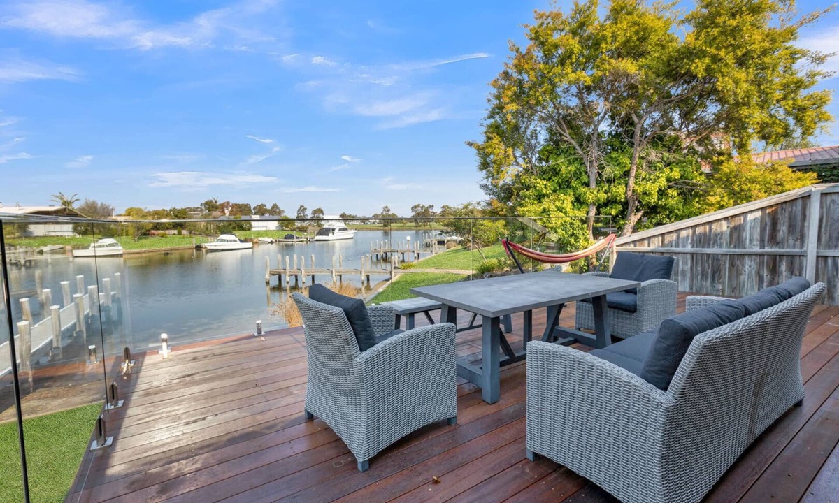 Paynesville House | Step onto the spacious deck and drink in the mesmerizing views of the water