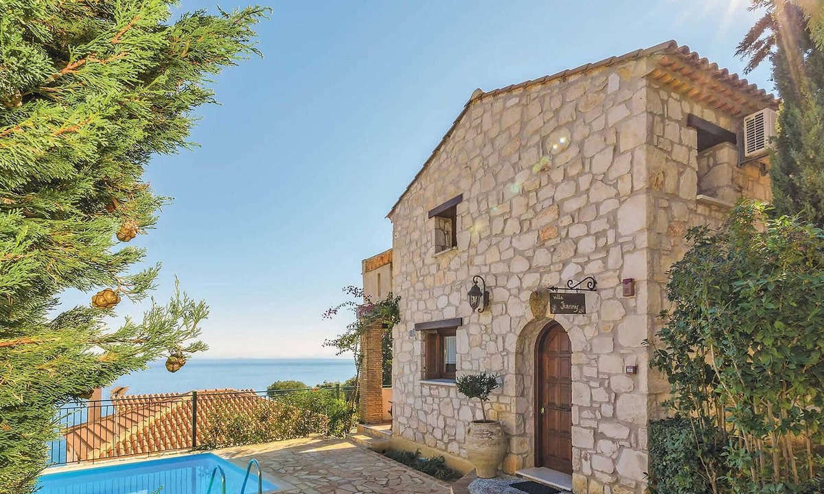Xirokastello House | This charming stone villa sits in a prime coastal location, set down off the main coastal road leadi