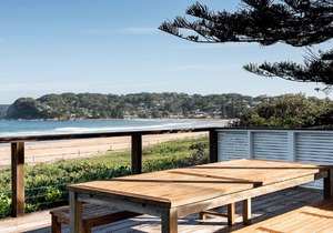 Absolute beachfront home with log fire