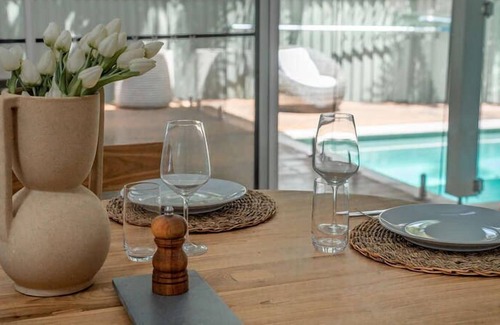 Bateau Bay House | Featuring a stunning open-plan living and dining area, this sunny, light-filled, well-appointed, ful