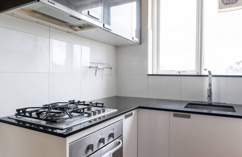 South Yarra Apartment | Maddox · MADDOX: 5min Walk to Train with Netflix & Parking