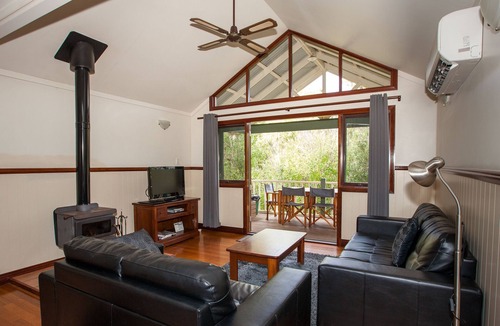 Margaret River Ski Chalet | 2 Bedroom Chalet offers 2 separate bedrooms with a large living/dining area and balcony.
