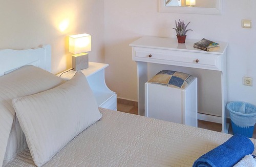 Longos Apartment | A charming apartment perched on the hillside above Loggos offering both easy access to the village a
