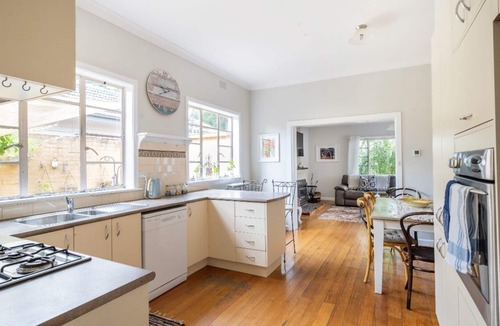 Rosebud Cottage | A charming european cottage close to the beach.