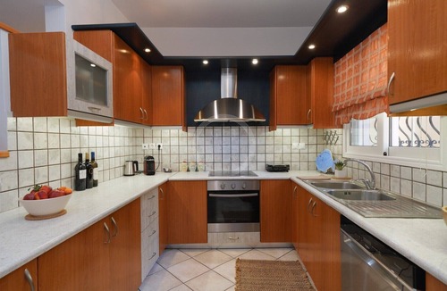 Porto Heli Apartment | A modern apartment with incredible views to the port of Porto Heli