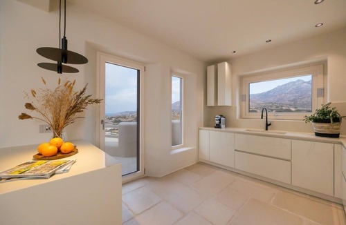 Naxos Villa | A private sanctuary above the Aegean . Sunlight, stillness, and the olive grove