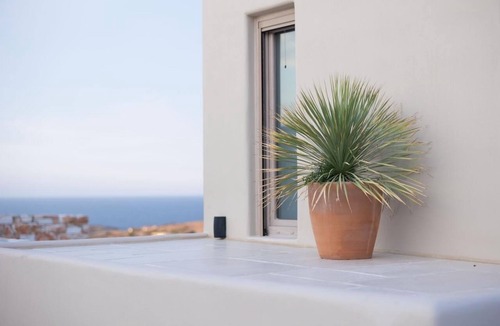 Naxos Villa | A private sanctuary above the Aegean . Sunlight, stillness, and the olive grove
