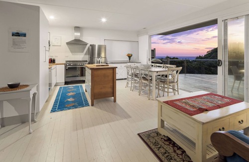 Scotts Head House | Absolute waterfront beach house with massive deck - family and dog friendly