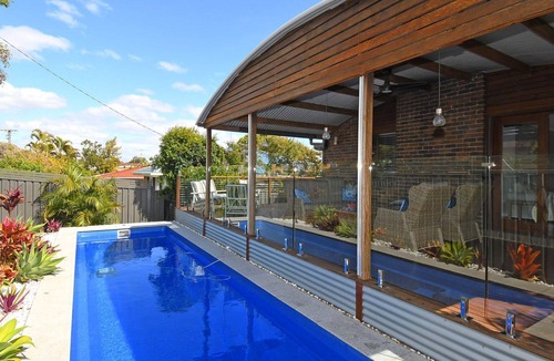 Scarness House | All Decked Out - Spacious split-level family or fishing retreat with pool, WIFI and room for the boa