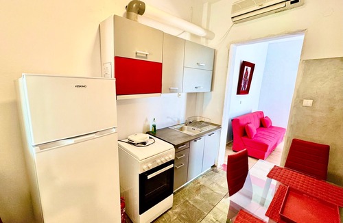 Agios Sostis Apartment | Apartment 'Porfira' with Private Garden, Wi-Fi and Air Conditioning