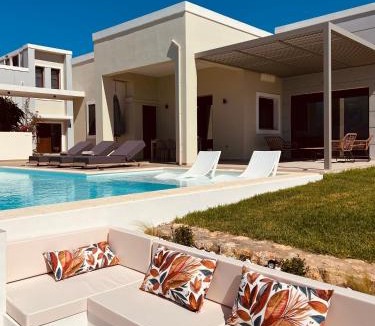 Pitharion Villa | Bay Overlook Villa heated pool