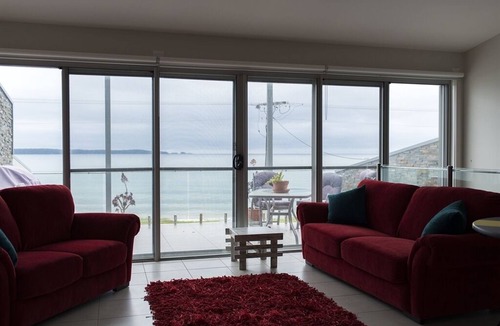 Batehaven Villa | Beautiful Beach front villa with views over Caseys Beach from every window