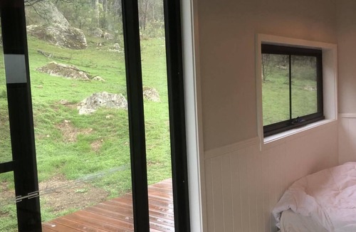 Upper Nile Cabin | Brand new cabin with cliff views, hiking trails, heated spa, farm stay