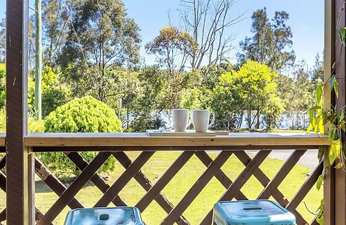 Mylestom Cabin | Cabin 1 – The Suite. Relax in comfort and get back to nature in 1 of 4 waterside Cabins