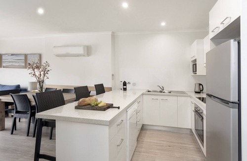 Paynesville Apartment | Captains Cove Waterfront Resort