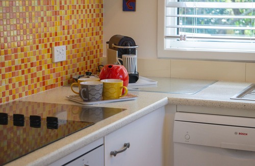 Macmasters Beach House | Castaway Macmasters Beach | Opposite beach path | Pet friendly & Fireplace