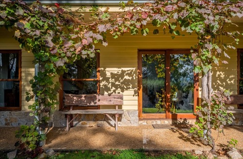 Wandiligong House | Centenary Heights - Boasting commanding views of the surrounding bushland and rolling hills of Wandiligong .
