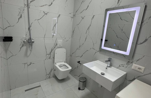 Kamez Apartment | Charming 1-bedroom in Bathore with AC, Wi-Fi, parking, and car rentals.