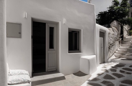 Mykonos Town House | Charming central townhome with bench in picturesque Mykonos Town alley, Wi-Fi/AC