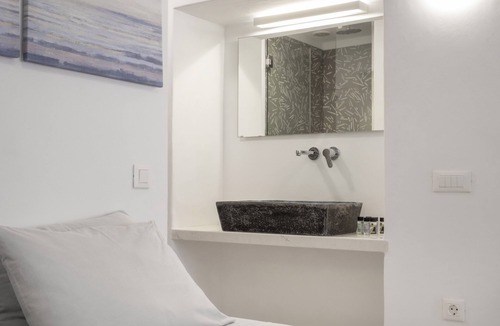 Mykonos Town House | Charming central townhome with bench in picturesque Mykonos Town alley, Wi-Fi/AC