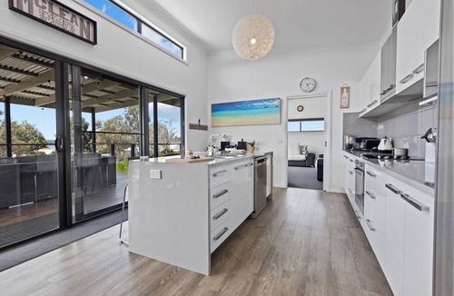 Newlands Arm House | Elevation: A stunning modern holiday home with a fantastic entertaining deck