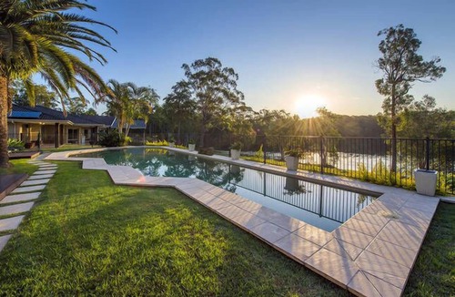 Emerald Beach House | EMERALD BEACH LAKE FRONT ESTATE-Heated Pool, Spa, Pizza Oven, Fire Pit, on Lake