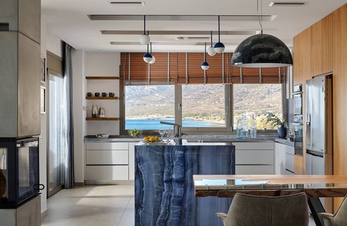 Koutsouras Condo | Exclusive beachfront penthouse retreat with private hot tub