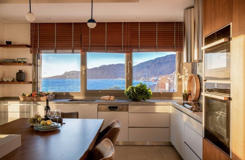 Koutsouras Condo | Exclusive beachfront penthouse retreat with private hot tub