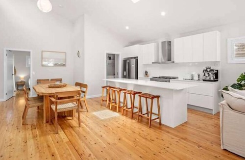 Bateau Bay House | Featuring a stunning open-plan living and dining area, this sunny, light-filled, well-appointed, ful