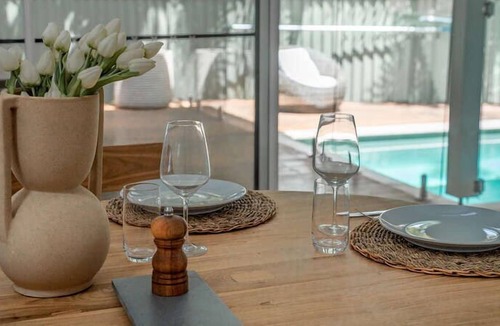 Bateau Bay House | Featuring a stunning open-plan living and dining area, this sunny, light-filled, well-appointed, ful