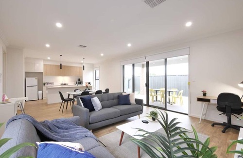 Woodville North House | FEEL HAPPY & AT HOME HERE. No stairs. Modern designer space. Ducted A/C. Double garage.