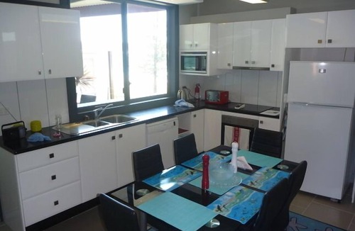 Bulli Apartment | GETWUNTOO on beautiful Sandon Point beach Bulli . Entire Top floor of house