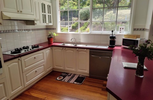 Eltham House | Gorgeous 4-Bedroom Home & Venue on a Mansion - an acre land with Pool & Garden n