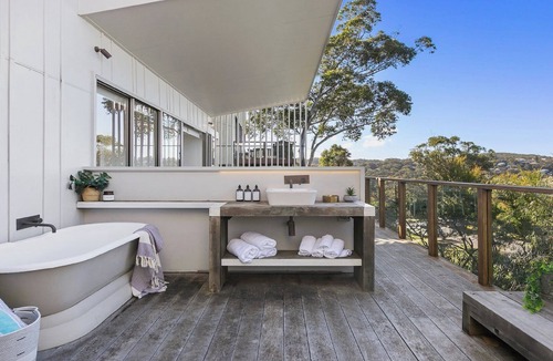 Macmasters Beach House | Great views and loads of room for all the family - with a fireplace!