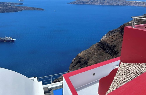 Imerovigli Villa | Hara's Houses, a unique cliffside villa with 5 private studios sharing a pool.