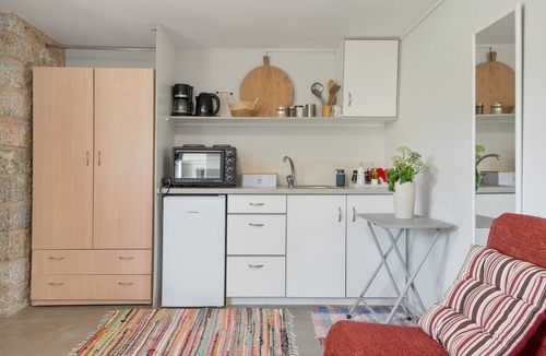 Panormos House | Holiday Home 'Boutique Stone Cottage' with Sea View, Wi-Fi and Air Conditioning