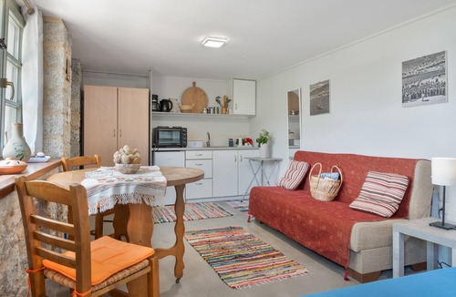 Panormos House | Holiday Home 'Boutique Stone Cottage' with Sea View, Wi-Fi and Air Conditioning