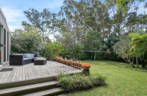 Bateau Bay House | Immaculate Beachside Home with Fireplace and Patio