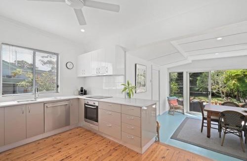 Bateau Bay House | Immaculate Beachside Home with Fireplace and Patio