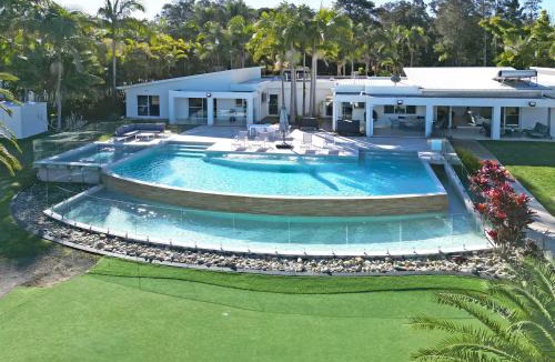 Dora Creek House | Lake Palm Resort Luxury Retreat absolute Waterfront on 3 acres at Lake Macquarie.