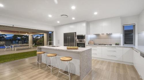 Banksia Beach House | Luxury Canal Front Holiday House