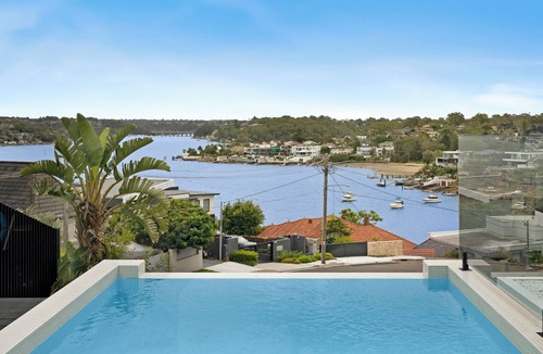 Kyle Bay House | Luxury Waterside Sanctuary with pool, sensational views, 2 decks & lift!